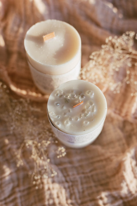 soy candles on blanket