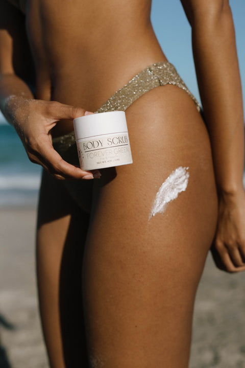body scrub sample on woman's leg