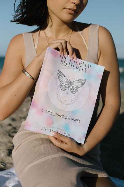 The Eternal Butterfly: A Coloring Journey Held By Woman