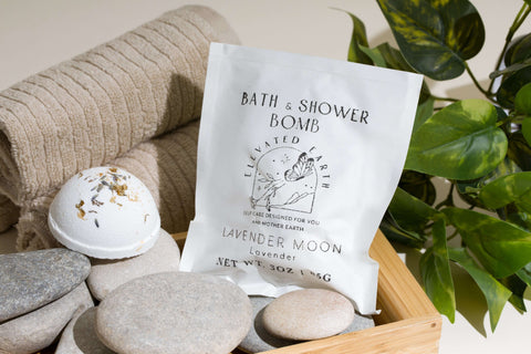bath and shower bomb with packaging in backdrop