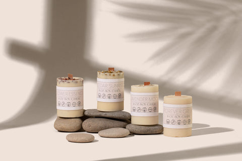 soy candles on rocks display